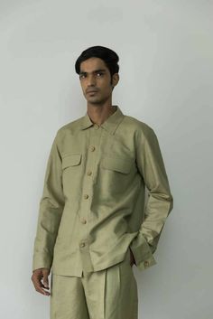 Description: Our commitment to craftsmanship results in refined staples like this overshirt. It's designed with utility-inspired details, such as the flap, patch and welt pockets and topstitching. The sleeves feature exaggerated cuffs. Layer yours over basic tees or pick from our range of shirts.Product Details: Relaxed fit Wide placket Long cuffed sleeves Color: Moss GreenFabric: Hemp Cotton 55% hemp & 45% cotton Made in India Size & Fit: Height: 6.1 ftModel is wearing size SFit: RelaxedGarment Fall Shirt With Roll-up Sleeves And Spread Collar, Classic Long Sleeve Shirt With Patch Pockets, Cotton Shacket With Button Cuffs And Lapel Collar, Cotton Shacket With Button Cuffs, Cotton Long Sleeve Shacket With Button Cuffs, Fall Utility Khaki Shirt, Unstructured Button-up Tops With Roll-up Sleeves, Spring Cotton Shacket With Button Cuffs, Fall Button-up Tops With Side Pockets