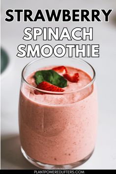 strawberry spinach smoothie in a glass with strawberries on top and text overlay that reads, strawberry spinach smoothie