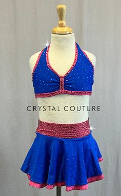 a blue and pink cheer uniform on a mannequin