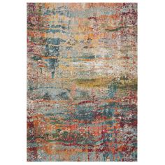 a multicolored area rug with an abstract design