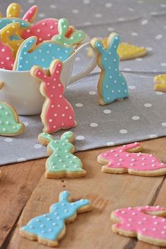 some decorated cookies are sitting on a table