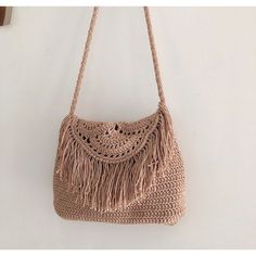 Casual Crochet Fringe Bag For Travel, Casual Fringe Shoulder Bag For Festivals, Casual Crochet Tote Bag With Tassels, Bohemian Crochet Bag With Fringe For Travel, Bohemian Summer Shoulder Bag With Tassels, Bohemian Jute Shoulder Bag For Beach Season, Bohemian Shoulder Bag With Tassels For Summer, Summer Beach Shoulder Bag With Tassels, Summer Travel Crochet Bag With Fringe