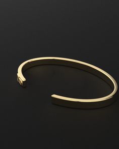 Whether you're looking for a traditional look or something newer, this cuff for men is a timeless piece of jewelry that you can wear for official events and everyday life.When choosing a men's jewel, ensure the style and material match your outfit. Choosing a comfortable men's bracelet is essential in ensuring it fits perfectly.Their exteriors and minimal shape allow the precious metal plating to shine through. You can wear them alone or with other minimal accessories with similar tones. This is Classic Open Cuff Jewelry For Formal Occasions, Timeless Adjustable Cuff Jewelry, Timeless Open Cuff Formal Jewelry, Minimalist Adjustable Jewelry For Business, Classic Adjustable Open Cuff Jewelry, Classic Adjustable Gold Bracelet With Polished Finish, Classic Cuff Jewelry For Everyday, Timeless Adjustable Cuff Bracelet With Strap, Timeless Formal Cuff Bracelet With Strap