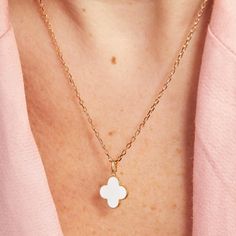 Colorful and pretty, our Personalized Enamel Clover Cross Necklace is a little token of luck to elevate any jewelry collection. This beautiful clover necklace is available in three eye-catching enamel colors. Each cross necklace be made into a lovely personalized gift by hand-engraving a special name onto the reverse of your charm.&nbsp;18K Champagne Gold Plated or 925 Sterling SilverCharm: 0.55x0.55&nbsp;Secure clasp fasteningCharms are removable from this chain and can be worn on all M Enamel Pendant Jewelry With Flower Charm, White Enamel Pendant Charm Necklaces, White Flower Charm Round Pendant Jewelry, Engraved Enamel Necklaces For Gifts, Engraved Enamel Necklace For Gifts, Engraved Enamel Necklace For Gift, White Good Luck Charm Necklaces, White Jewelry With Flower Pendant Charms, White Round Pendant Jewelry With Flower Charm