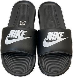 Casual Black Flip Flops For Streetwear, Nike Open Toe Slides For Streetwear, Black Non-slip Flip Flops For Streetwear, Non-slip Black Flip Flops For Streetwear, Cushioned Open Toe Flip Flops For Streetwear, Nike Slides For Summer Streetwear, Nike Black Slide Sandals, Nike Open Toe Slides With Rubber Sole, Black Flip Flops For Summer Streetwear