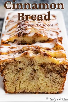 cinnamon bread with icing on a white plate