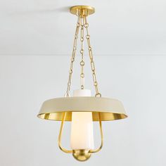 a light fixture hanging from the ceiling in a room