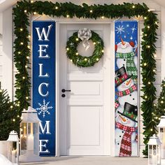 a welcome snowman door cover with wreaths and lights