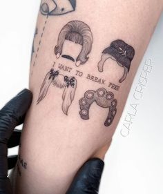 tattoos on the arm of a woman with different types of hats and haircuts