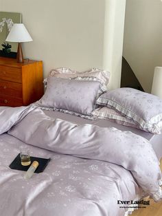 Transform your bedroom into a serene oasis with Ever Lasting's Pastel Tencel Ruffle Bedding Set.... Cute Purple Bedroom, Dorm Makeover, It Girl Bedroom, Blue Bedding Sets, Stylish Bedding, Reversible Bedding, Purple Bedroom, Ruffle Bedding, Tencel Fabric