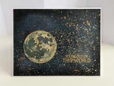 a card with the words you're out of this world written in gold on it