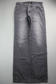 Men's 2015 Lucky Brand Jeans 221 Original Straight Dark Gray Distressed Size 30x32 Zipper Fly             ACTUAL MEASUREMENTS (Measurements are taken of the item lying flat and pulled tight without stretching. All measurements are approximate and in inches):   Waist (Measured from side to side and multiplied times 2): 30 Inseam (Measured from bottom of crouch to end of pants leg): 32 Hip (Measured at the base of the zipper from side to side and multiplied times 2): 40 Thigh (Measured from bottom Gray Low Rise Jeans, Dark Grey Clothes, Gray Clothes, Grunge Pants, Dark Grey Jeans, Thrift Inspo, Gray Jeans, Diy Fashion Clothing, Guys Clothing Styles