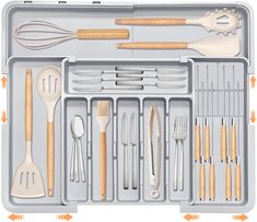 a tray with utensils and spoons in it