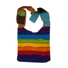 These bright, colorful, handcrafted bags make a great gift. Spacious and comfortable, they are perfect for travel or a casual day out. Available as shoulder bags or backpacks. Shoulder bags have a both a zipper and button closure, as well as an extra inside zipper pocket. Backpacks have a button and drawstring closure, adjustable straps, and loop for hanging. Please choose style in selection menu. Photos show examples of bag styles. Colors are miscellaneous and will vary. Made of 100% cotton. Multicolor Mobile Phone Pouch Bag, Casual Multicolor Satchel Canvas Bag, Casual Multicolor Canvas Tote Bag, Casual Multicolor Everyday Bags, Casual Multicolor Bags For Everyday, Casual Multicolor Canvas Bag, Multicolor Casual Canvas Travel Bag, Casual Multicolor Canvas Travel Bag, Casual Multicolor Canvas Bag For Everyday Use