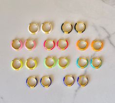 Colorful neon enamel hoops Stringed Bracelets, Preppy Earrings, Rings Cheap, Preppy Jewelry, Surfer Bracelets, Jewelry Accessories Ideas, Colorful Accessories, Jewelry Dainty, Jewelry Essentials