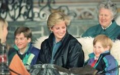 two women and three children sitting on a bench with an older woman in the background