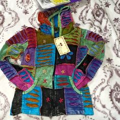 India Boutique Zip Up Hoodie Juniors Size Large Multicolored 2 Pockets Nwt Colorful Casual Patchwork Sweater, Colorful Patchwork Casual Sweater, Blue Patchwork Top For Winter, Winter Blue Patchwork Top, Multicolor Patchwork Top For Winter, Multicolor Casual Winter Hooded Jacket, Casual Multicolor Hooded Winter Jacket, Casual Multicolor Winter Hooded Jacket, Multicolor Long Sleeve Cotton Sweatshirt