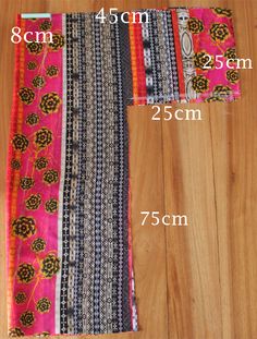 the measurements of a table runner on a wooden floor with different colors and patterns in it