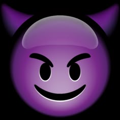 a purple devilish smiley face with horns