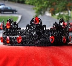 "Black Lion Gothic Crown, King Crown, Male Crown, Men's Crown, Crowns and Tiaras, black, Medieval, Head Accessories, Custom Crown, halloween This is great handmade medieval style crown. Unique design and fine jewelry quality of work. Great accent for kings or queens or other noble character, great accessory for both events and regular usage. - Crown is made to fit head circumference, please measure the size as it showing on a picture. - Choose stones colors you like - Higher point 3\" ( 8 cm) Ready to ship" Men Crowns King, Black Fantasy Costume Accessories For Larp, Black Medieval Costume Accessories For Costume Party, Black Medieval Costume Accessories For Parties, Medieval Black Costume Accessories For Party, Black And Red Crown, Persephone Wedding, Crown Male, Dark Romance Wedding