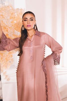 Heavily embellished Peach Pink Pakistani Salwar Suit Dupatta is a dreamy design that is etched with great finesse and detail onto a gleaming tea pink canvas.