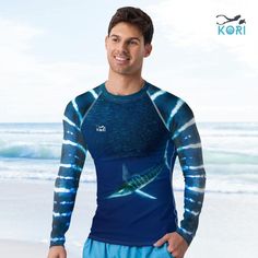 Explore the ocean in billfish style while protecting your skin from the sun with this UPF 50+ long-sleeve rash guard. Comfortable and slim fit, this rash guard features the striking blue and white pattern of a Striped Marlin. Perfect for ocean and fish lovers! FEATURES - 82% polyester, 18% spandex - Very soft four-way stretch fabric  - Fitted design - UPF 50+ - Moisture-wicking -Suitable for watersports CARE -To increase the longevity of your rash guard, be sure to thoroughly rinse after each use to remove any chlorine or salt. -Avoid contact with rough surfaces or velcro since they can pull out the white fibers in the fabric and damage the rash guard's appearance.  DISCLAIMER Actual product color may vary from images shown. Every monitor and digital display have different color calibratio