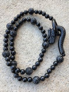 Vintage Translucent Natural Black Jadeite Jade Carved Dragon Clasp Bead Necklace ....Total of weights 92.1grams...Measure 23'' Length With 60 Beads Black Jade 8 to 12MM ...It's in very good condition. Spiritual Obsidian Round Bead Jewelry, Spiritual Obsidian Jewelry With Round Beads, Obsidian Round Beads Jewelry 8mm, Black Agate Gemstone Beads, Obsidian Beaded Jewelry For Healing, Spiritual Obsidian Beaded Jewelry, Black Agate Round Bead Necklaces, Black Agate Bead Necklaces, Black Agate Bead Necklace