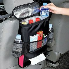 the back seat pocket is filled with water bottles and other items to keep things organized