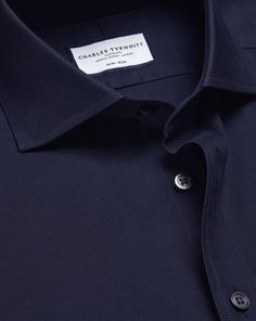 100% cotton, Available in slim and extra slim fit, Non-iron, Modern spread collar, Split yoke for optimal fit and comfort, Slim fit: back pleats for ease of movement, Extra slim fit: streamline back darts, Mitred two-button cuff or square French cuff, Complimentary brass collar stays, Machine washable - Cutaway Collar Non-Iron Twill Shirt - Navy | Men's Charles Tyrwhitt Cutaway Collar Non-Iron Twill Dress Shirt - Navy Single Cuff Blue Size Small Cotton Cotton Business Tops With Welt Pockets, Classic Slim Fit Top With Spread Collar, Classic Fitted Tops With Straight Hem, Fitted Dress Shirt For Business, Timeless Slim Fit Office Tops, Timeless Slim Fit Tops For Office, Classic Navy Dress Shirt For Formal Occasions, Classic Fitted Cotton Shirt, Slim Fit Top With Spread Collar And Placket