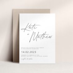 a wedding card with the word kate and matten written on it in black ink