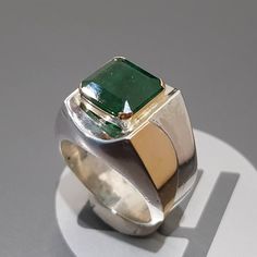 Watch video here: https://youtu.be/oy8TZ2IHB1o Natural Unheated Untreated beautiful Swat Rich green dark Emerald Rich Green Beautiful Color Stone weight : 7.30 Carats Stone shape is emerald cut Stone has natural inclusions but not broken Highest Quality Emerald Premium 925 Sterling Silver Ring size 10 US Resize able as per buyer choice Premium Quality Engagement Ring Anniversary Ring Shipping option is FedEx Three working days Handling Time Lowest Price ever for this kind of Big emerald. Contact Modern Emerald Ring With Center Stone, Green Emerald Ring With Bezel Setting, Formal Green Emerald Ring With Polished Finish, Modern Round Emerald Ring With Center Stone, Green Emerald Jewelry With Bezel Setting, Polished Emerald Jewelry, Green Signet Ring With Bezel Setting For Gift, Modern Emerald Round Rings, Elegant Green Emerald Cut Signet Ring