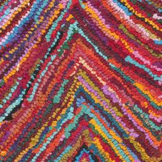 a multicolored rug with many different colors