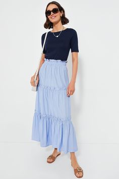 Twirl worthy with its tiered layers and ruffle detailing, the Cornflower Blue Stripe Prado Skirt slips on with minimal effort while bringing maximum style. This pull on maxi is a one step elevation to a casual look while keeping you ultra-chic. Pair with a fitted tank or blouse and sandals, sneakers, or flats! Elastic ruffle waistband Tiered skirt Ruffle seams Pleated style Contrast ruffle hem Unlined and slightly sheer Material: 50% Polyester, 50% Cotton Care: Hand wash cold, hang to dry Skirt Ruffle, Lisa Marie Fernandez, Olympia Le Tan, Sea New York, Cocktail Attire, Sheer Material, Red Stripe, Cornflower Blue, Weekend Wear