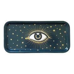 a tray with an eye and stars painted on the side, in gold glitters