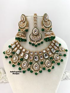 Premium quality Kundan Necklace comes with elegant Jhumki Earrings and Tikka/ trendy Indian bridal set/Premium Quality Polki and Kundan Jewelry/green color   All items are shipped from Brampton, Ontario, Canada. If you need your item by a certain day, please reach out to us for express delivery option before placing the order so that we can update the shipping for you. Standard shipping/delivery timeline Below are the delivery timeline estimates. We dispatch all orders by the next business day. ---> USA delivery timeline * 3-5 business days to major urban centers in USA. It may take 1-2 days extra to remote locations ---> Canada delivery timeline  * 2-3 business days - GTA  & Montreal  * 2-4  business days - Rest of Ontario/Quebec * 2-6 business days-  Rest of Canada    ---> Europe/Middle Green Kundan Bridal Necklace Hand Set, Green Kundan Necklace For Wedding, Heavy Green Jewelry Sets For Wedding, Green Kundan Jewelry Sets As Gift, Green Kundan Jewelry Sets For Gifts, Green Kundan Jewelry For Wedding, Green Round Kundan Jewelry, Green Round Jewelry Sets For Wedding, Green Kundan Necklaces For Wedding