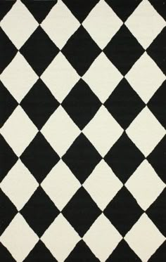 a black and white rug with an argyle pattern on the bottom, which is very large