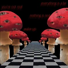 there are many red mushrooms on this black and white checkered floor