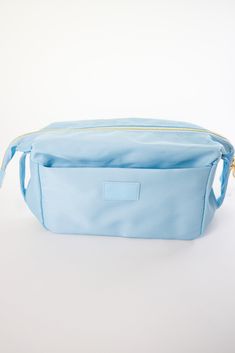 Made of Nylon Approximately 9.5 x 4.5 x 6.3 inches Gold Hardware Outer pocket Cosmetic Bum Bag, Cosmetic Pouch, Makeup Pouch, Travel • Made in United States Blue Travel Pouch With Pockets, Blue Pouch Cosmetic Bag, Functional Blue Pouch Cosmetic Bag, Travel Cosmetic Shoulder Bag With Zipper, Nylon Cosmetic Bag With Removable Pouch, Zipper Pouch Cosmetic Shoulder Bag For Travel, Everyday Nylon Cosmetic Bag With Removable Pouch, Everyday Nylon Cosmetic Bag Pouch, Everyday Nylon Pouch Cosmetic Bag