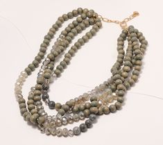 three strand beaded necklace with grey and white beads