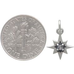 Light up your jewelry designs with this sterling silver 8 point star charm with a nano gem at the center. The shimmer and shine of this star charm adds just the right finishing touch to your jewelry line. Great for earrings and charm necklaces. Length measurement includes the 5 mm soldered jump ring. Sterling Silver Star Of David Charms Jewelry, Silver Star Of David Jewelry With Charms, Silver Round Pendant With Star Charm Jewelry, Silver Round Pendant With Star Charm, Silver Jewelry With Star Charm On Round Pendant, Silver Round Pendant Jewelry With Star Charm, Silver Star Of David Charm Jewelry, Personalized Star-shaped Sterling Silver Jewelry, Silver Star Of David Birthstone Jewelry