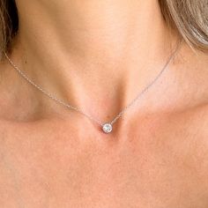 Necklace made with a single Zircon, 6 mm size 925 sterling silver chain. Available lengths for the cord:  14 inch / 35 cm, 15 inch / 38 cm, 16 inch / 40 cm,  17 inch / 43 cm,  18 inch / 45 cm Free gift box: You will receive this necklace in a beautiful gift box with cushion inside! Let me pleasantly surprise your loved ones on your behalf if it's a gift! Please note each crystal is one of a kind! Each will display its own unique personality, and it will vary slightly in color and pattern. If you Anniversary Hypoallergenic Round Pendant Necklace, Hypoallergenic Round Pendant Necklace For Anniversary, Classic Adjustable Cubic Zirconia Necklaces, Adjustable Diamond Necklaces For Anniversary, Sterling Silver Chain Necklace With Round Pendant For Anniversary, Adjustable Diamond Necklace For Anniversary, Silver Solitaire Round Pendant Necklace For Everyday, Diamond White Sterling Silver Chain Necklace As Gift, Hypoallergenic Pendant Necklace For Anniversary