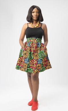 Embrace the boldness and beauty of African fashion with this exquisite skirt that seamlessly blends tradition with modern style. FEATURES: - Main colours: Red/ Yellow/ Black/ Green - Multi-coloured - Comfortable fit - Synched waist/High - Above knee length - A-line skirt - Ankara print/ 100% cotton - wax cotton fabric Elegant Flared Multicolor Maxi Skirt, Relaxed Full Skirt With Wide Waistband, Multicolor Full Skirt For Party, Multicolor Long Skirt For Party, Elegant Multicolor Flared Maxi Skirt, Elegant Multicolor Flared Skirt, Multicolor Relaxed Fit Maxi Skirt For Party, Relaxed Fit Multicolor Maxi Skirt For Party, Multicolor Flowy Pleated Skirt Dress