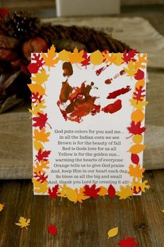 a thanksgiving card with an image of a child's handprint on it and fall leaves