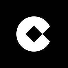 a black and white photo with the letter c in it's center, on a dark background