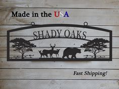 a sign that says shady oaks with an image of two animals and the words, made in the usa