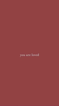 the words you are loved written on a red background with white text in front of it