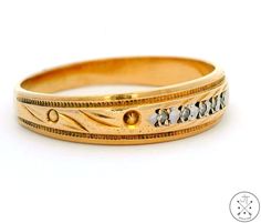 A beautiful blend of luxury and simplicity, this solid 14k Yellow Gold band is adorned with 5 dazzling natural Diamonds that create a captivating sparkle. Its sleek design is perfect for those who love to make a subtle yet impactful statement. A must-have addition to any jewelry collection. Stamped with a makers mark and '14k', this 2.6 gram classy band gently tapers from 4.7 mm at the top to 2.6 mm at the bottom for comfortable wear.  ----SHIPPING INFORMATION---- We ship Monday through Friday, 14k Gold Diamond Ring With Decorative Band, Fine Jewelry 14k Gold Diamond Ring With Decorative Band, Elegant 14k Stamped Bands For Anniversary, Elegant Stamped 14k Round Band, Formal 14k Gold Bands, 14k Gold Bands For Formal Occasions, Formal Gold Eternity Band With Brilliant Cut, Classic Gold Eternity Band, Classic Formal Diamond Ring With Decorative Band