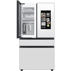 a white refrigerator freezer with its door open and an appliance on the side