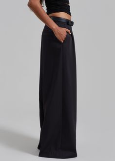 Color: Black Lightweight fluid fabric Relaxed fit Wide leg Pleated detailing Side seam pockets Illusion welt back pocket Hook and bar closure Zip fly Unlined 75% Polyester 25% Rayon Dry Clean By The Frankie Shop. Imported Sleek Wide Leg Pants With Belt Loops For Evening, Sleek Wide Leg Pants For Evening With Belt Loops, Chic Wide Leg Dress Pants With Concealed Placket, Chic Black Wide Leg Pants With Pressed Crease, Evening Dress Pants With Belt Loops And Straight Leg, Full Length Evening Pants With Belt Loops, Classic Wide Leg Pants With Hidden Pockets, Evening Full-length Dress Pants With Belt Loops, Evening Full Length Dress Pants With Belt Loops