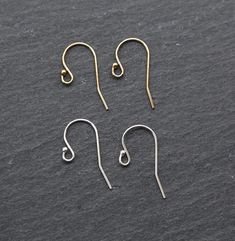 1 Pair Lever Back Dainty 14K Gold Filled, Sterling Silver Earring Findings - Twist ball loop to side to attach your charms or beads. NO RETURNS ON EARRINGS - for sanitation reasons ✦ Quantity: 2 pieces (1 pair) ✦ Material: 14k gold filled, or sterling silver ✦ Dimensions: 19mm x 11mm (.76 mm thick) ✦ Surface: shiny gold, shiny silver ** Please note that not all charms will slide onto these hoops. You may need jump rings to attach the charm to the hoops. If you have any questions about if a charm Crochet Simple, Ear Wires, Shiny Silver, Earring Findings, Hook Earrings, Jump Rings, Diy Earrings, Sterling Silver Earrings, Gold Filled